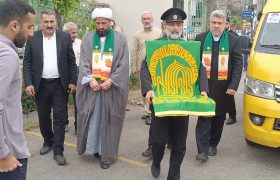 بیرق متبرک امام رضا همزمان با دهه کرامت در شهرستان علی آباد کتول